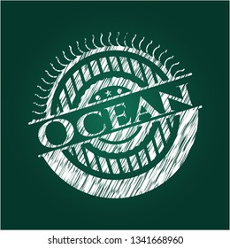 Ocean chalk emblem written on a blackboard