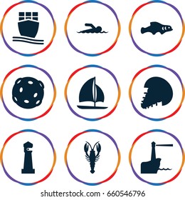 Ocean icons set. set of 9 ocean filled icons such as crab, lighthouse, cargo ship, sailboat, swimmer, extinct sea creature