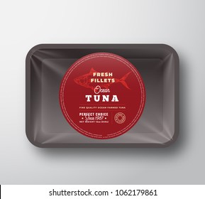 Ocean Tuna Fillets. Abstract Vector Fish Plastic Tray with Cellophane Cover Packaging Design Round Label or Sticker. Retro Typography and Hand Drawn Tuna Silhouette Background Layout. Isolated.