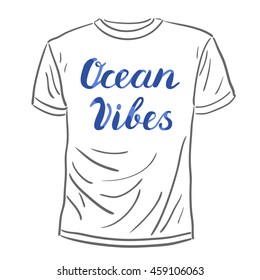 Ocean vibes. Brush hand lettering. Handwritten words on a sample t-shirt. Great for beach tote bags, swimwear, holiday clothes, and more.