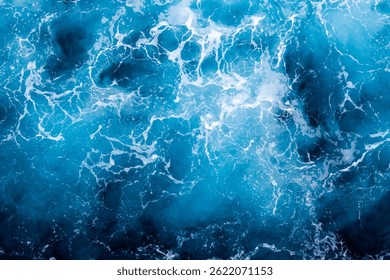 Ocean water surface background. Aerial view of breathtaking foamy water. Can be used in covers, packaging, posters, textures, banners, art, and design projects. Artistic vector illustration.