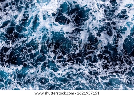Ocean water surface texture. Aerial view of enchanting water with foam. Can be used in covers, packaging, posters, textures, cards, art and design projects. Stunning vector illustration.