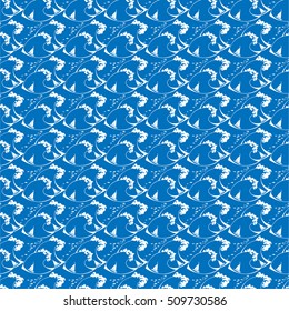ocean wave.On a blue background the white foam of the waves and sailing yachts with floating fish.