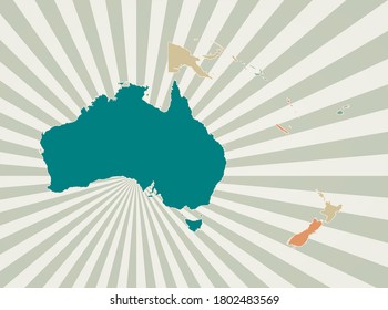Oceania map. Poster with map of the continent in retro color palette. Shape of Oceania with sunburst rays background. Vector illustration.