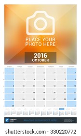 October 2016. Wall Monthly Calendar for 2016 Year. Vector Design Print Template with Place for Photo and Year Calendar. Week Starts Sunday