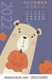 October 2022. Bear calendar. Cute bear with pumpkin for Halloween on a purple background. Vector illustration in a flat style. Vertical template. Week From Sunday. Stationery for design and printing