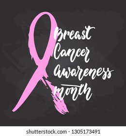October Breast Cancer Awareness Month lettering phrase on black chalkboard background. Brush ink vector quote for banners, greeting card, poster design