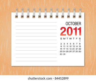 October month calendar 2011 on wood background