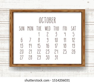 October year 2019 vector monthly calendar. Week starting from Sunday. Hand drawn text in a wooden frame over light brown rustic distressed wood background.