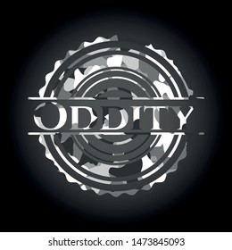 Oddity on grey camouflage texture