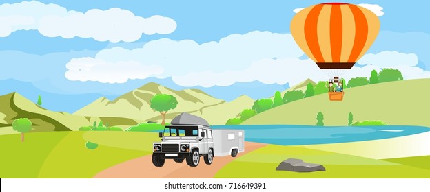 Off road automobile with trailer,in green field, air balloon on air