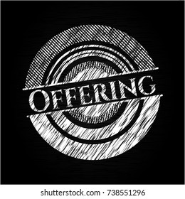 Offering written on a chalkboard