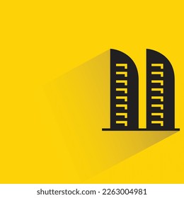 office building with shadow on yellow background