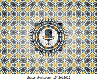 office chair icon inside arabesque style badge. arabic decoration.