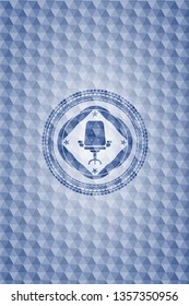 office chair icon inside blue polygonal badge.