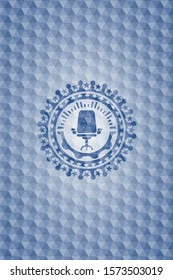 office chair icon inside blue hexagon badge.