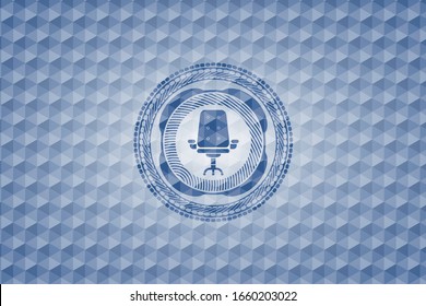 office chair icon inside blue emblem with geometric pattern background.