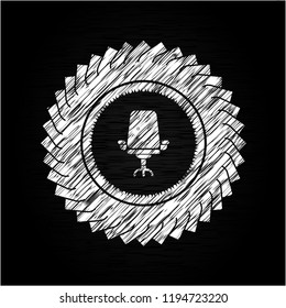 office chair icon inside chalk emblem written on a blackboard