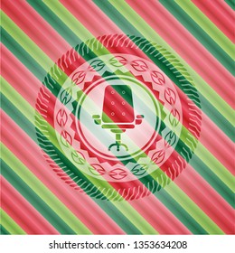 office chair icon inside christmas emblem background.