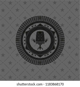 office chair icon inside dark badge or emblem