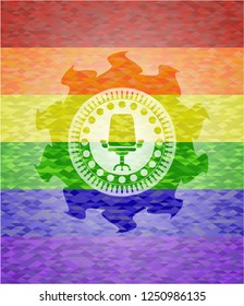 office chair icon inside emblem on mosaic background with the colors of the LGBT flag