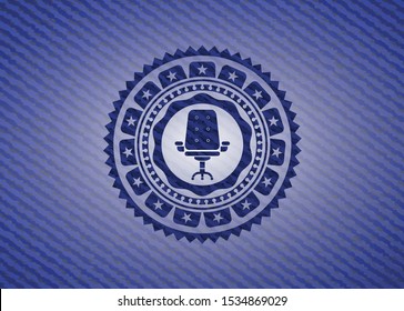 office chair icon inside emblem with denim high quality background