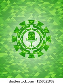 office chair icon inside green emblem with mosaic ecological style background