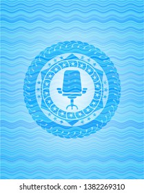 office chair icon inside light blue water badge background.