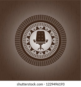 office chair icon inside realistic wood emblem