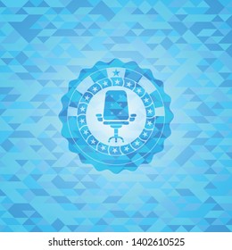 office chair icon inside realistic light blue mosaic emblem