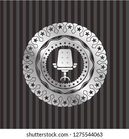 office chair icon inside silver shiny emblem