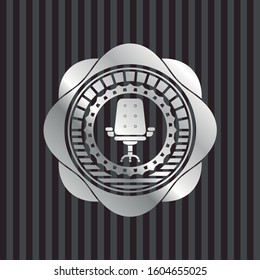 office chair icon inside silver shiny badge