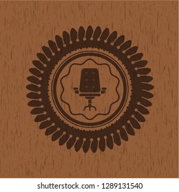 office chair icon inside wooden emblem. Vintage.