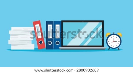 Office Desk with Laptop Binders Paper Stack and Alarm Clock