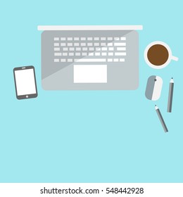 Office desk with laptop,smartphone and coffee cup top view background.