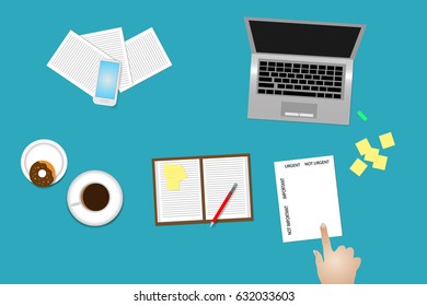 Office desk top view with supplies, coffee cup and donut. Finger is pointing paper with time management method Important and urgent.