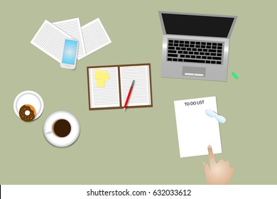 Office desk top view with supplies, coffee cup and donut. Finger is pointing paper with time management method To Do List