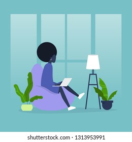Office furniture. Young black female manager sitting on the bean bag chair. Daily life. Flat editable vector illustration, clip art