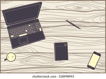 Office items on the wooden table