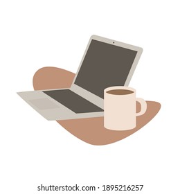 Office laptop and a cup of coffee.  Workplace concept. New technologies, a side view of an open laptop, millennials at work, a startup industry
