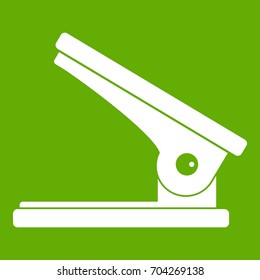 Office paper hole puncher icon white isolated on green background. Vector illustration