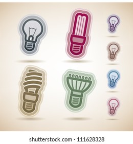 Office Supply Objects, from left to right, top to bottom:   Classic lightbulb, Fluorescent eco lightbulb,Spiral fluorescent eco lightbulb, Led eco lightbulb.