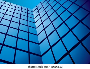 Office tower blocks with glass front and blue sky