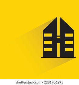 office tower with shadow on yellow background