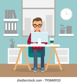 Office work and remote work, freelance. Young man working on computer. Vector illustration in flat style.