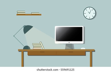 office work space with lighting lamp and computer screen monitor  