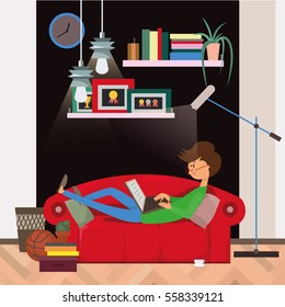 office worker with a computer. freelance designer. a man lying on the couch. home office interior