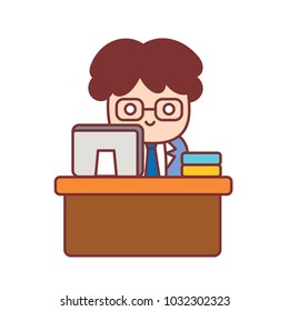 An office worker is sitting at the computer desk.