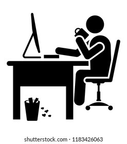 Office worker sitting on his desk having snacks 
