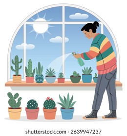 Office worker sprays succulents. The plants are in various sizes and colors, including a few cacti. The woman is wearing a striped sweater and jeans. Concept of calm and relaxation.